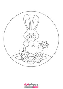 Coloriage pâques lapin dans une bulle avec œufs et fleur à colorier